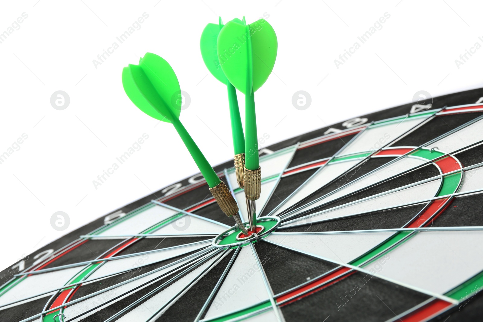 Photo of Dart board with color arrows hitting target, closeup