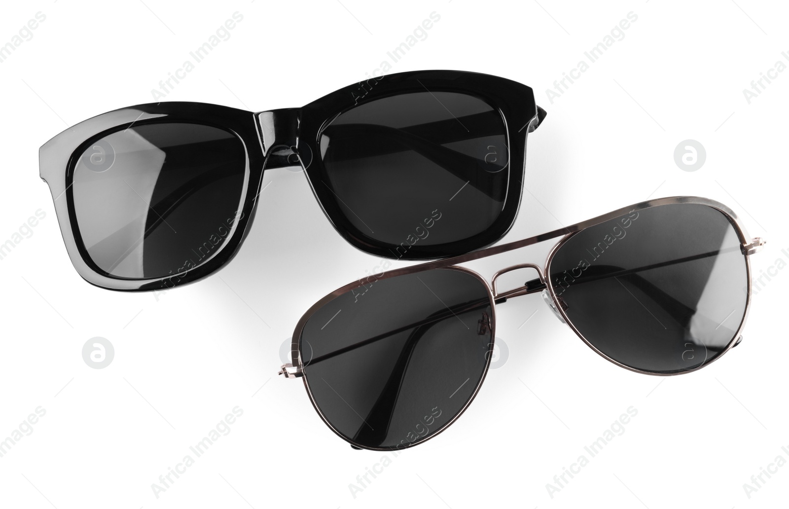 Photo of Different stylish sunglasses on white background. Sun protection