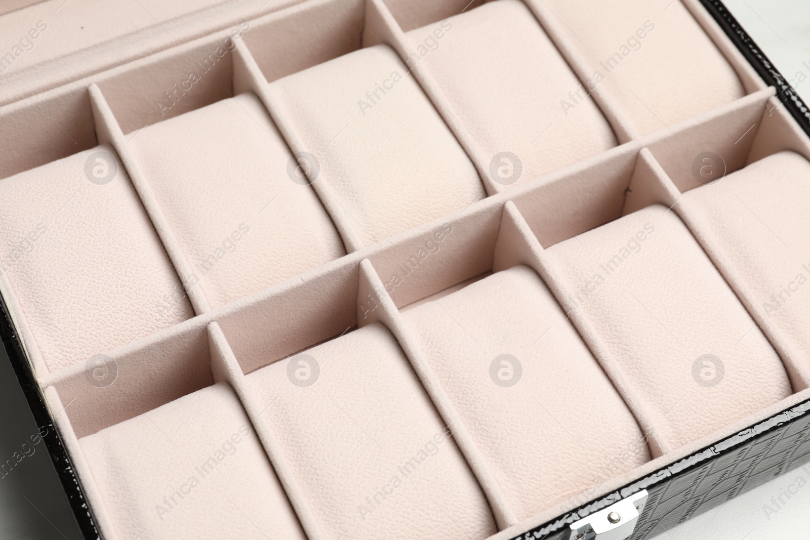 Photo of Stylish empty jewelry box on table, closeup