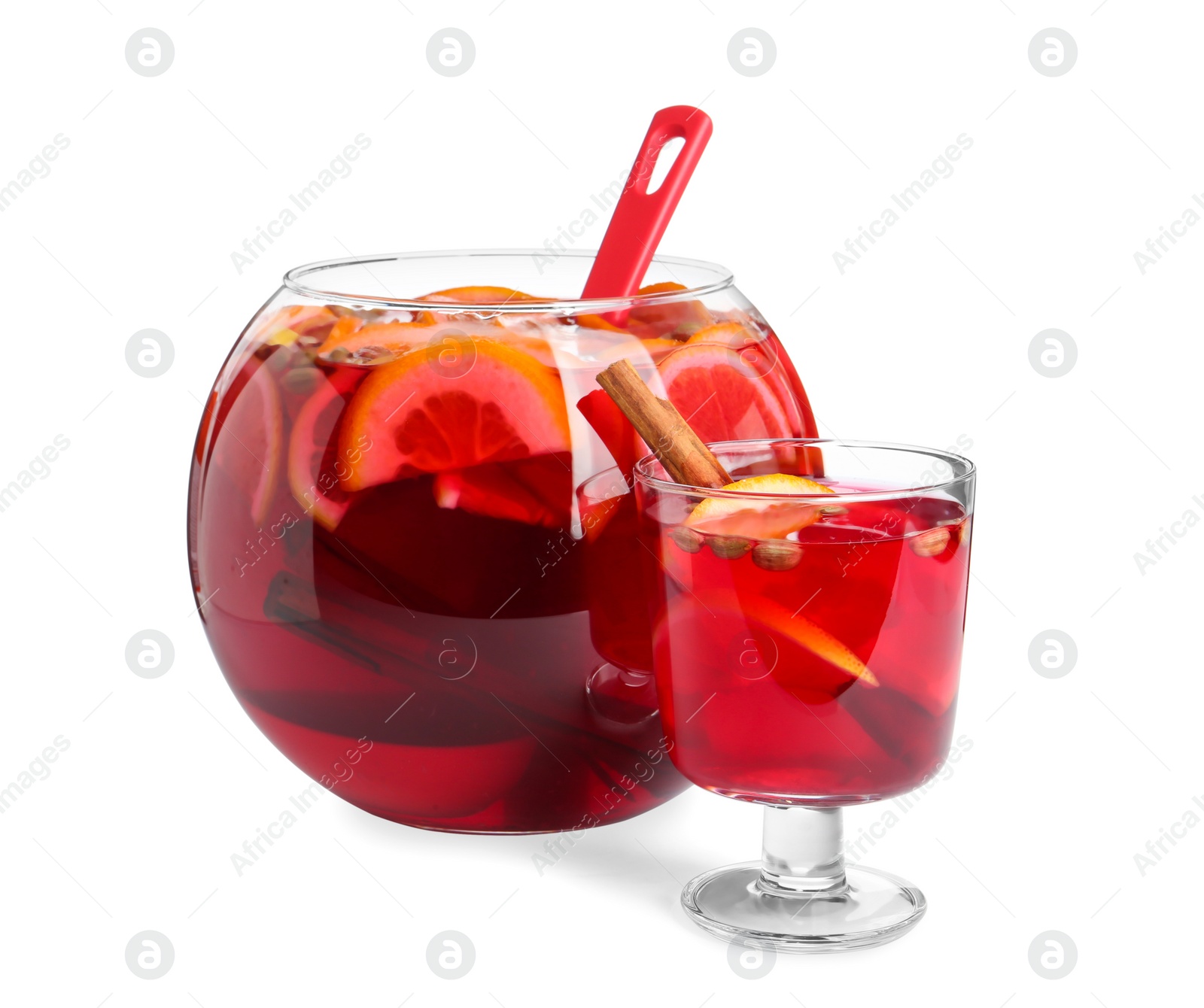 Photo of Glass and bowl with aromatic punch drink isolated on white