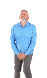 Mature man with urological problems suffering from pain on white background