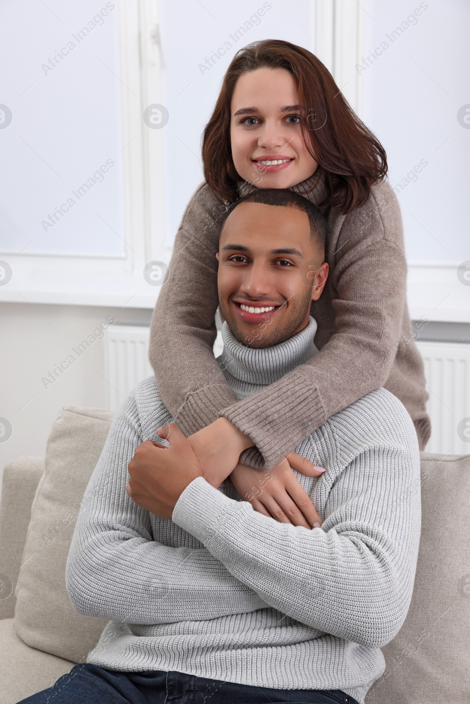 Photo of Dating agency. Happy couple enjoying time together at home