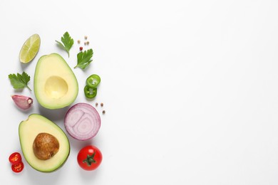 Photo of Fresh ingredients for guacamole on white background, flat lay