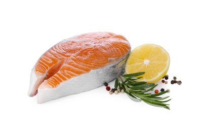 Photo of Fresh raw salmon steak with rosemary, peppercorns and lemon on white background