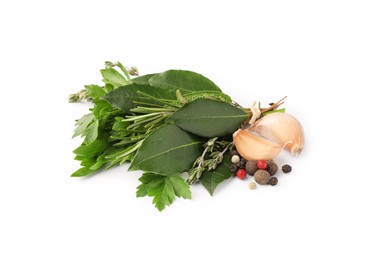 Aromatic bay leaves, different herbs and spices isolated on white