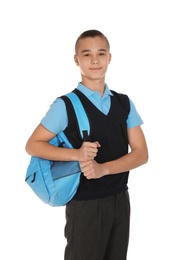 Portrait of teenage boy in school uniform with backpack on white background