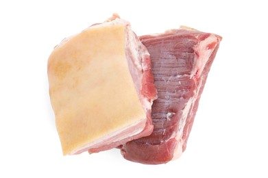 Photo of Pieces of raw pork belly isolated on white, top view