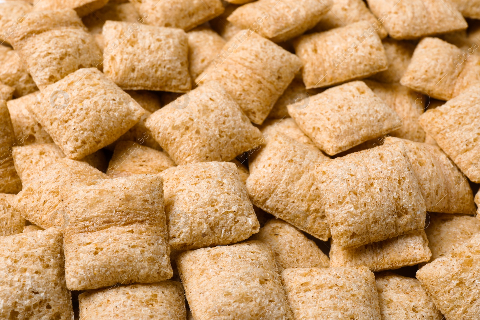 Photo of Delicious crunchy corn pads as background, closeup