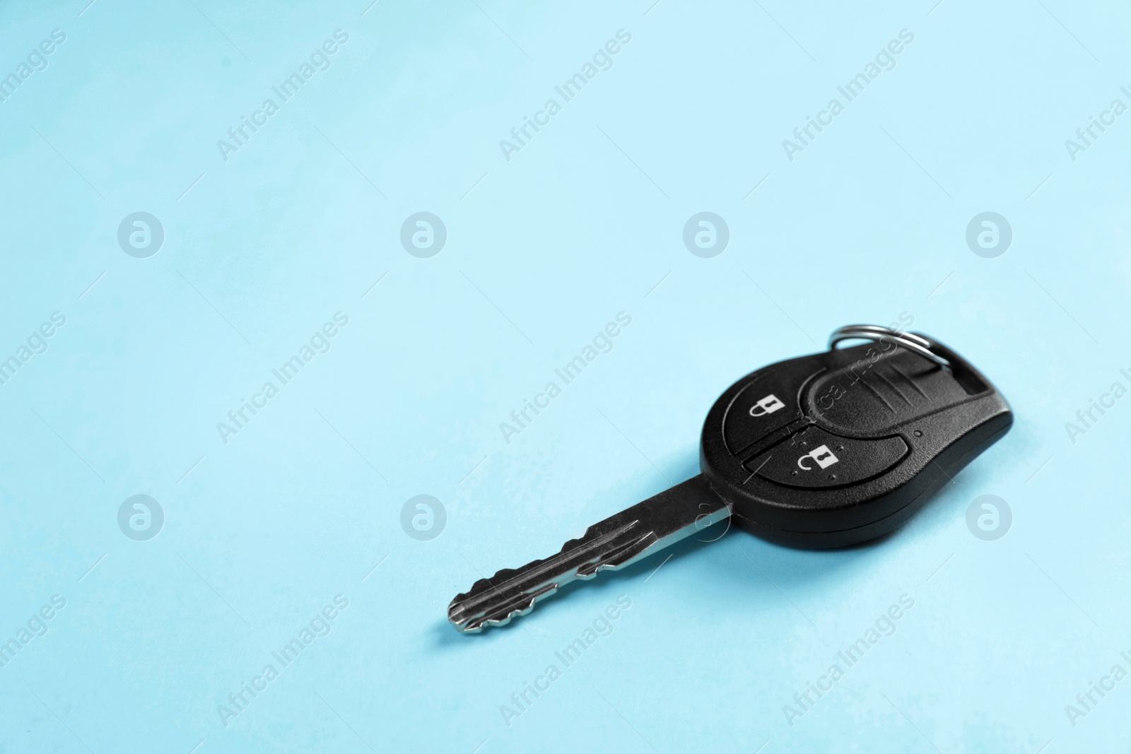 Photo of Car key on color background. Space for text