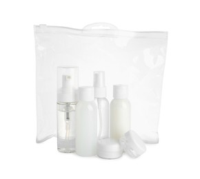 Cosmetic travel kit in plastic bag isolated on white. Bath accessories