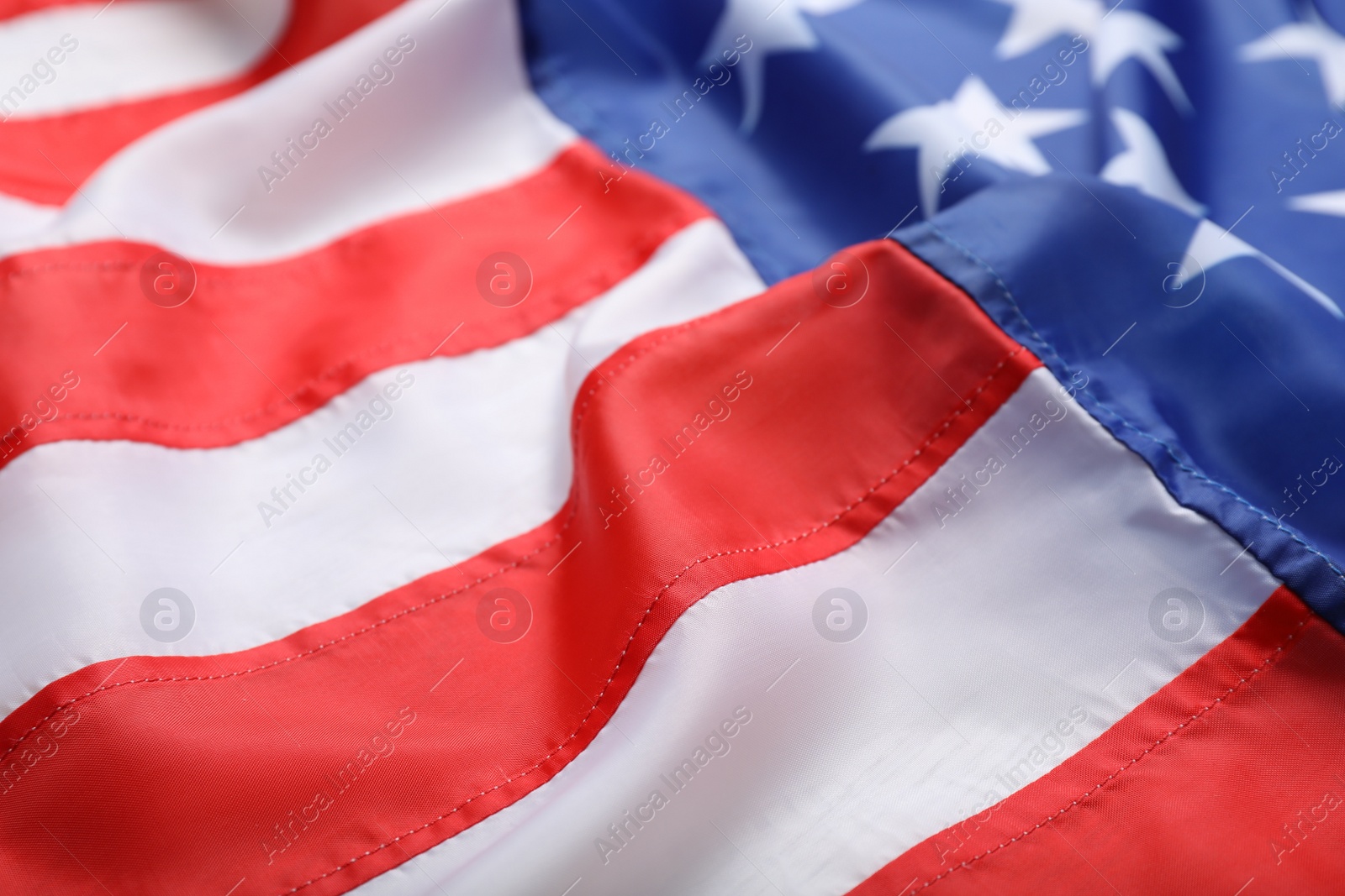 Photo of American flag as background, closeup. National symbol of USA