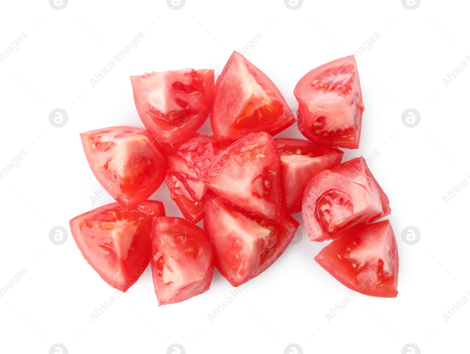 Photo of Pieces of red ripe tomato isolated on white, top view