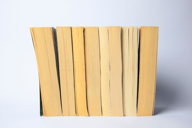 Collection of different books on light background