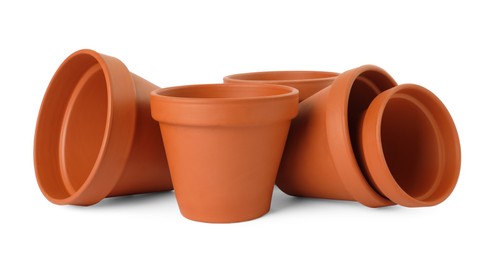 Empty clay flower pots isolated on white
