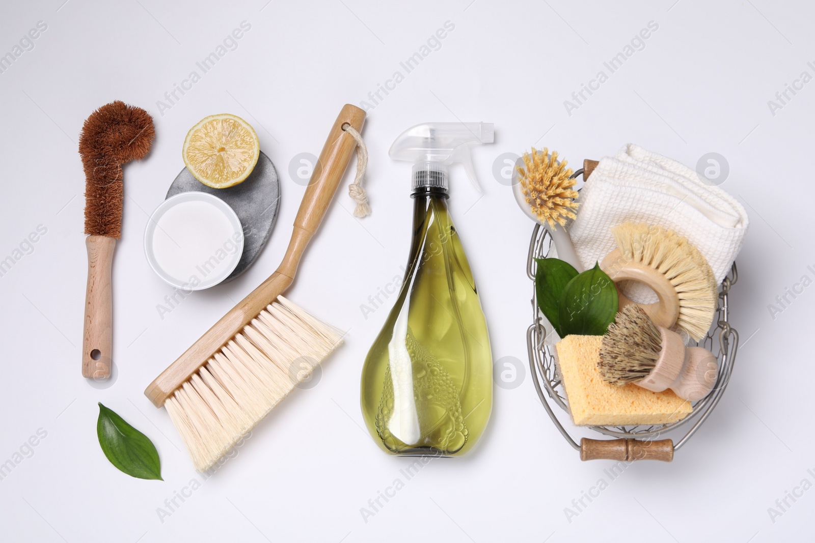 Photo of Flat lay composition with different cleaning supplies on white background