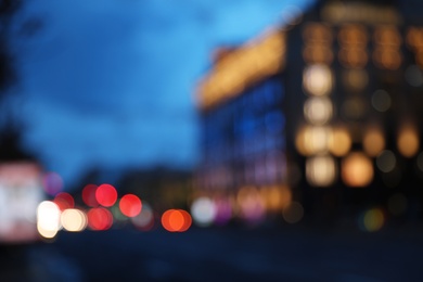 Blurred view of modern city at evening. Bokeh effect