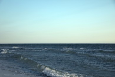 Picturesque view of sea under beautiful sky