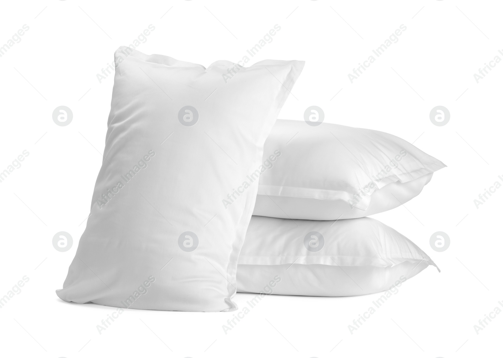 Photo of Many new soft pillows isolated on white