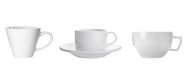 Set with different ceramic coffee cups on white background. Banner design