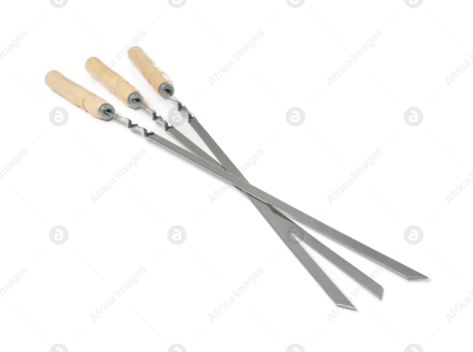 Photo of Metal skewers with wooden handle on white background