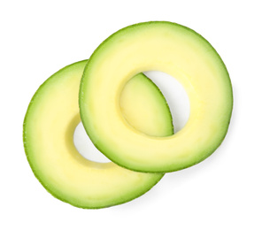 Slices of tasty ripe avocado on white background, top view