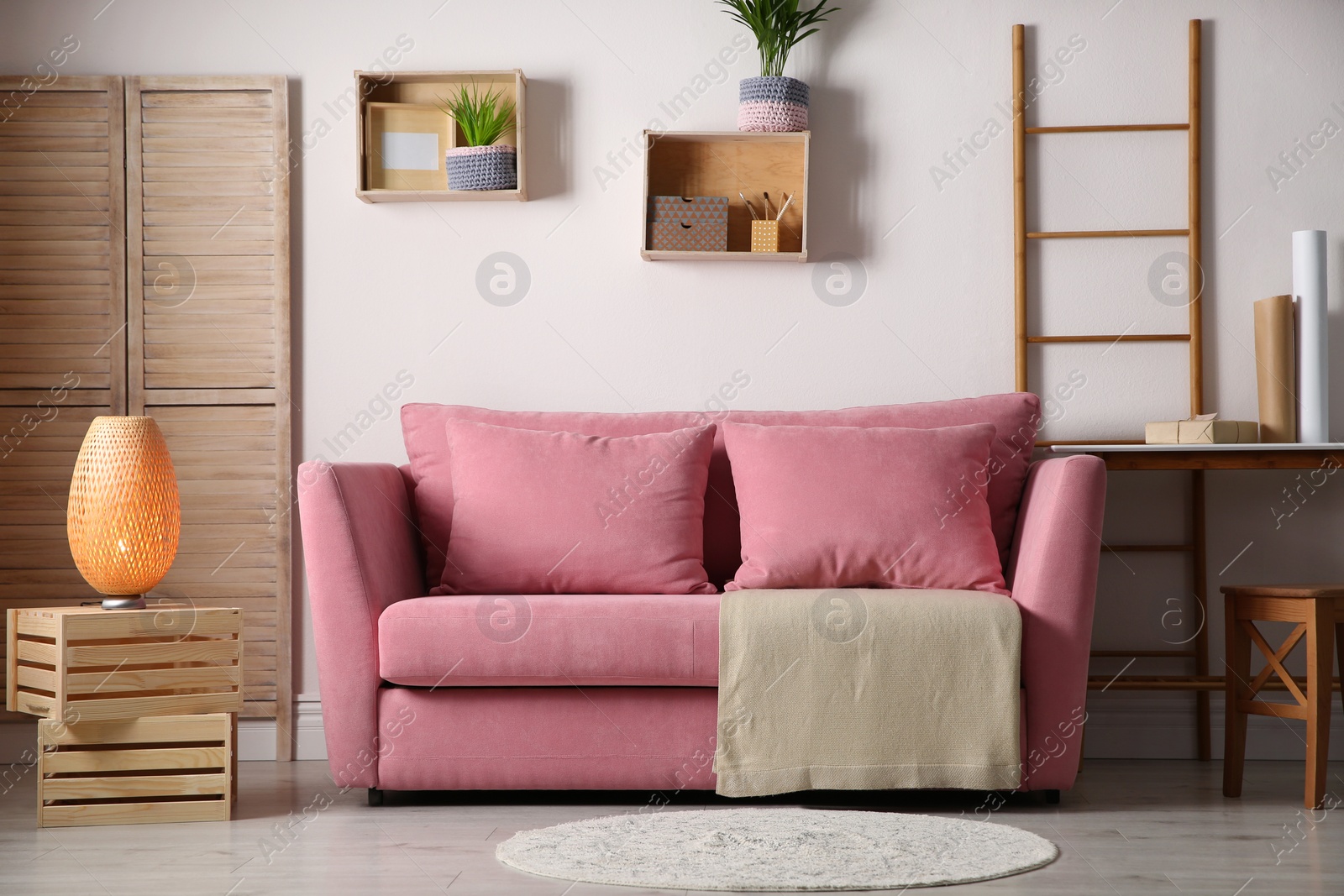 Photo of Modern living room interior with stylish pink sofa