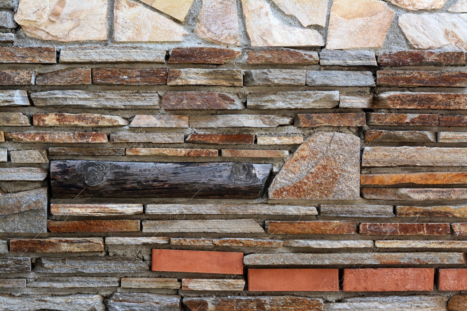 Photo of Texture of old stone wall as background, closeup