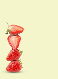 Image of Stack of fresh strawberries on beige background, space for text