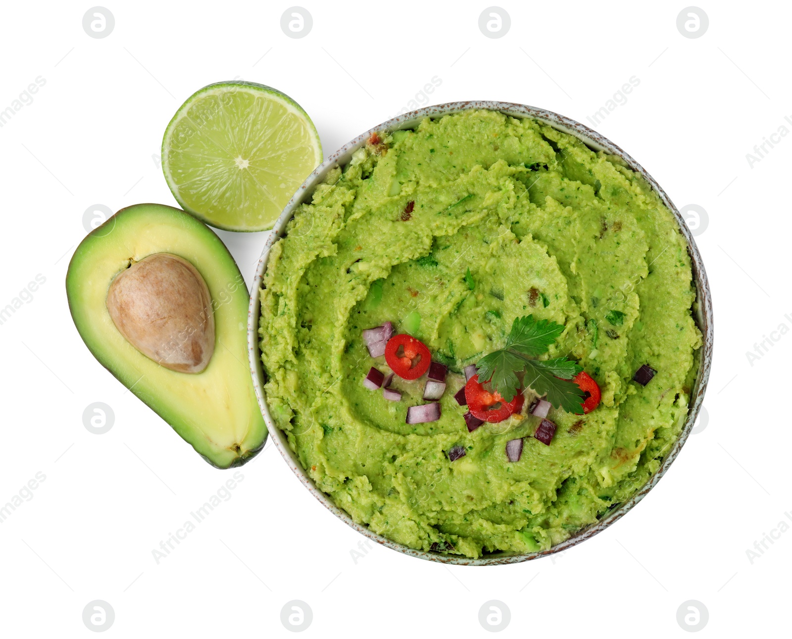 Photo of Bowl of delicious guacamole, fresh avocados and lime isolated on white, top view