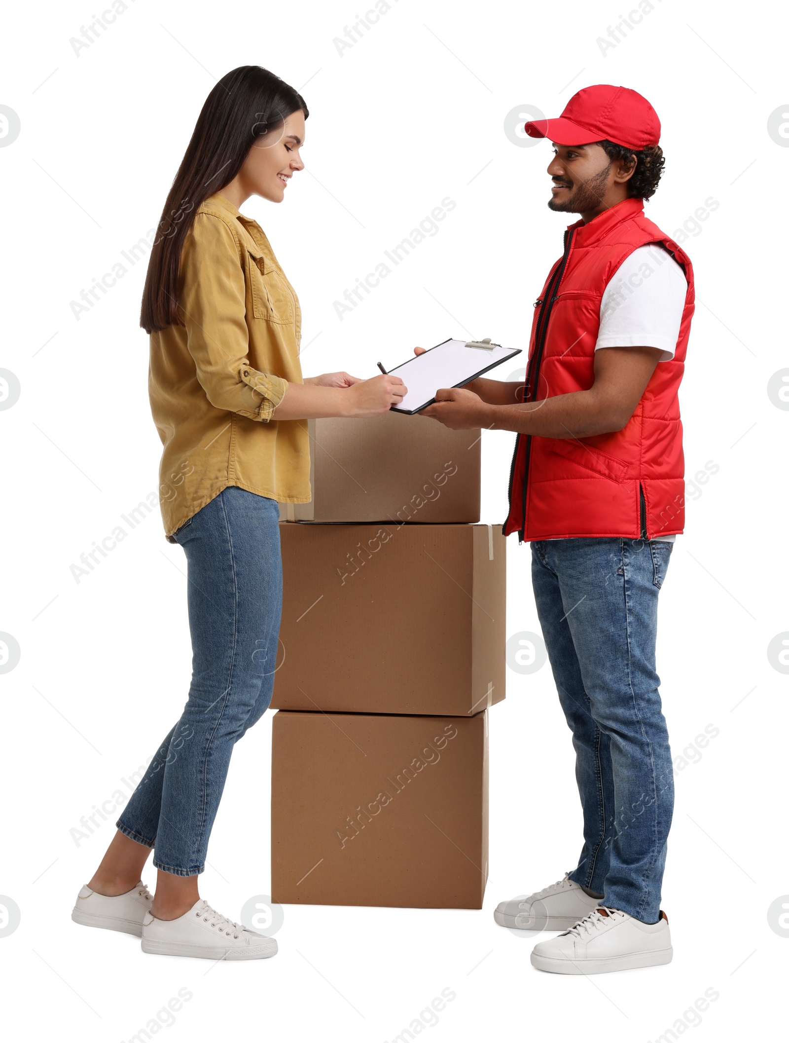 Photo of Smiling woman signing order receipt on white background. Courier delivery