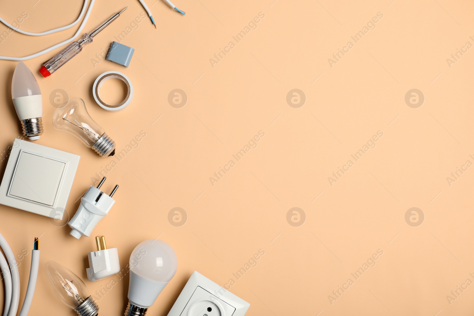 Photo of Flat lay composition with electrician's tools and space for text on color background