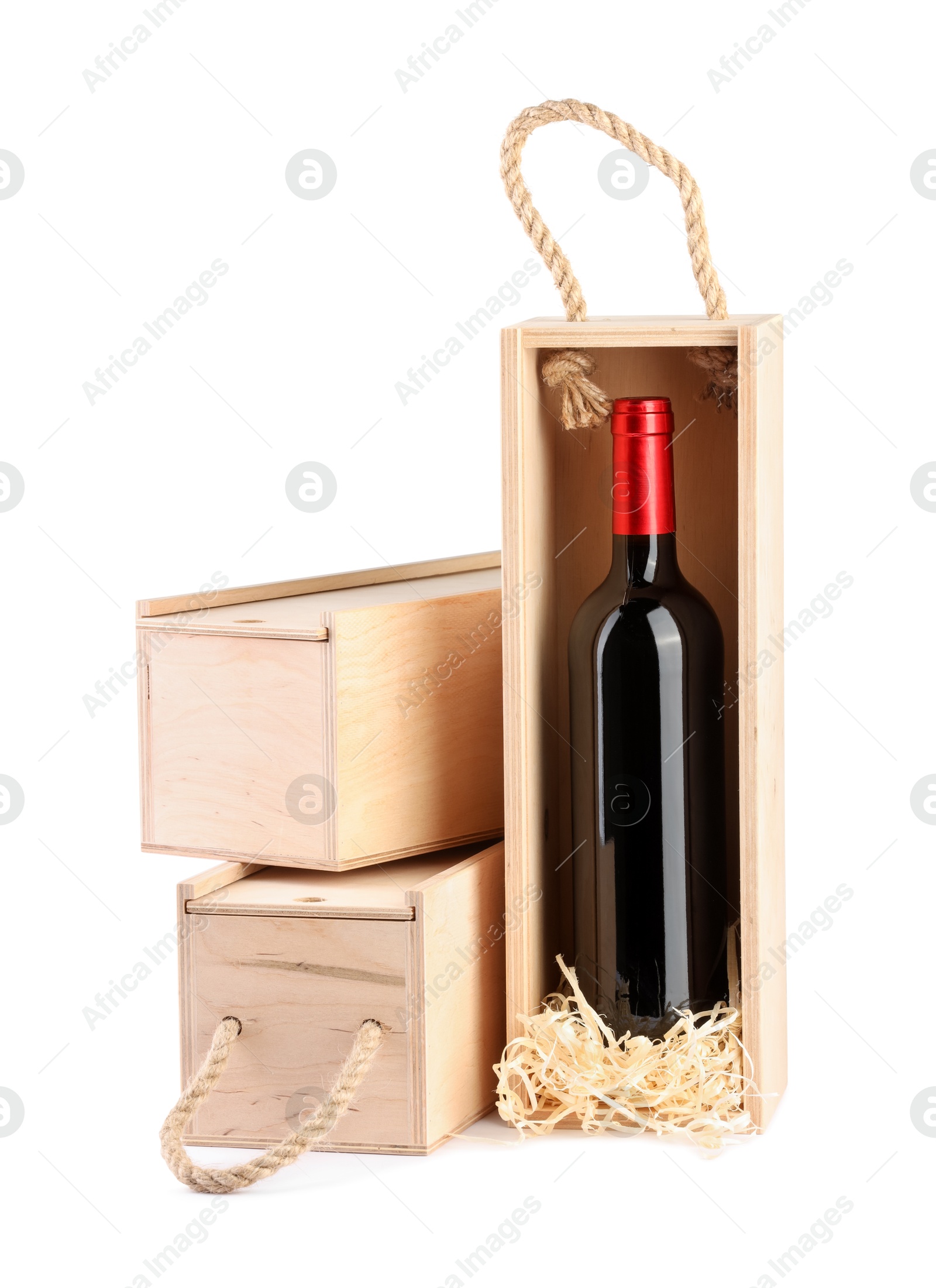 Photo of Wooden gift boxes with wine isolated on white