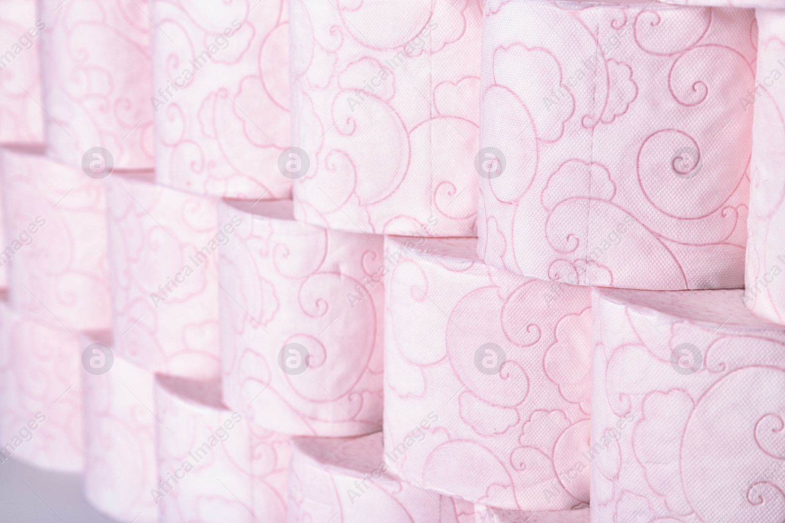 Photo of Many rolls of toilet paper as background. Personal hygiene