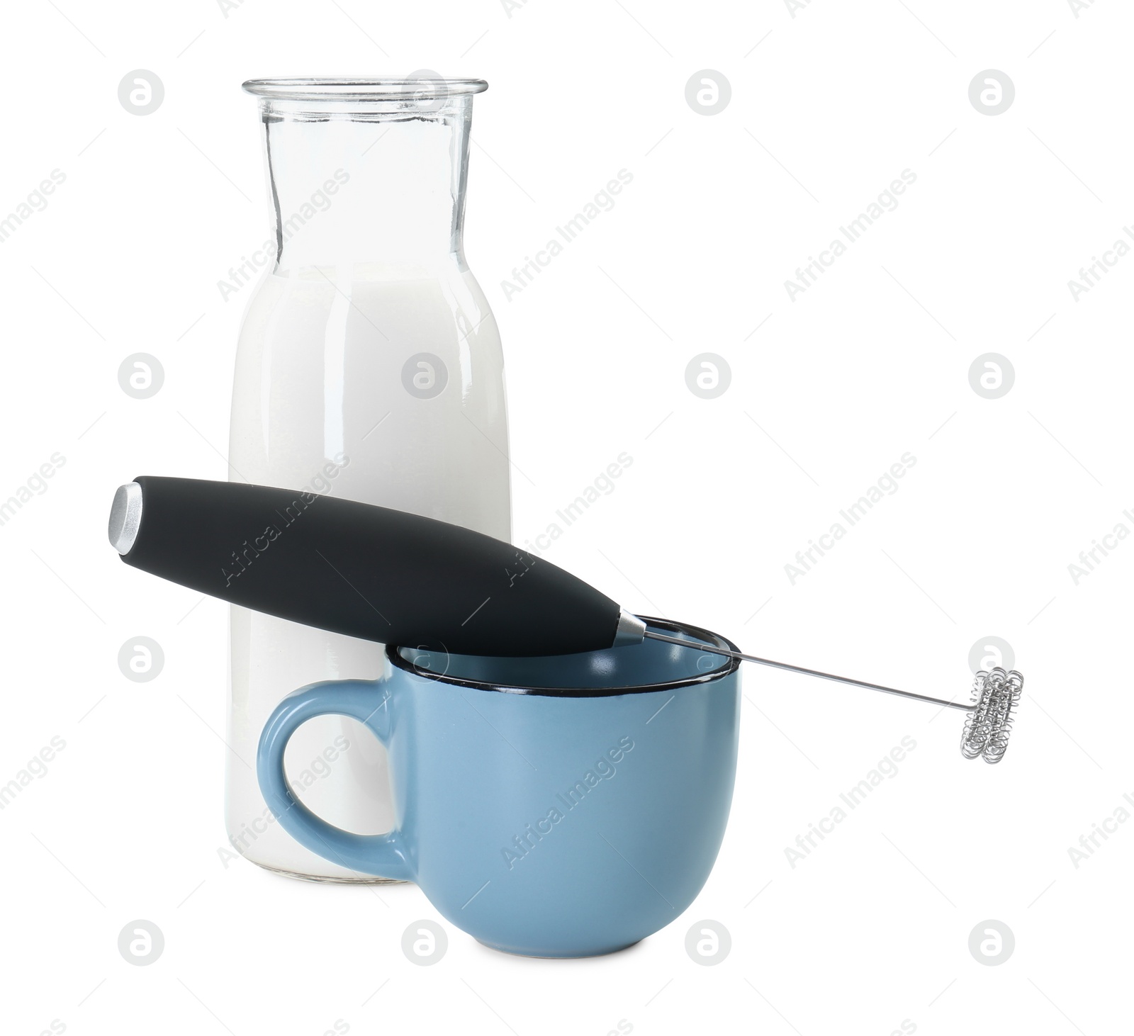 Photo of Milk frother wand, cup and glass carafe isolated on white