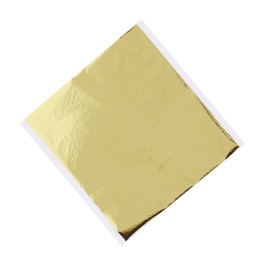 Photo of Edible gold leaf sheet isolated on white