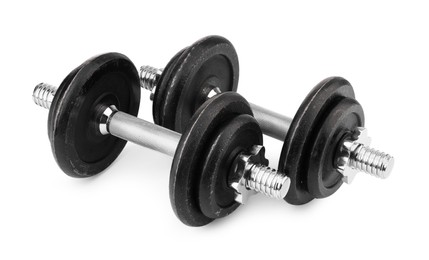 Photo of Metal dumbbells isolated on white. Sports equipment