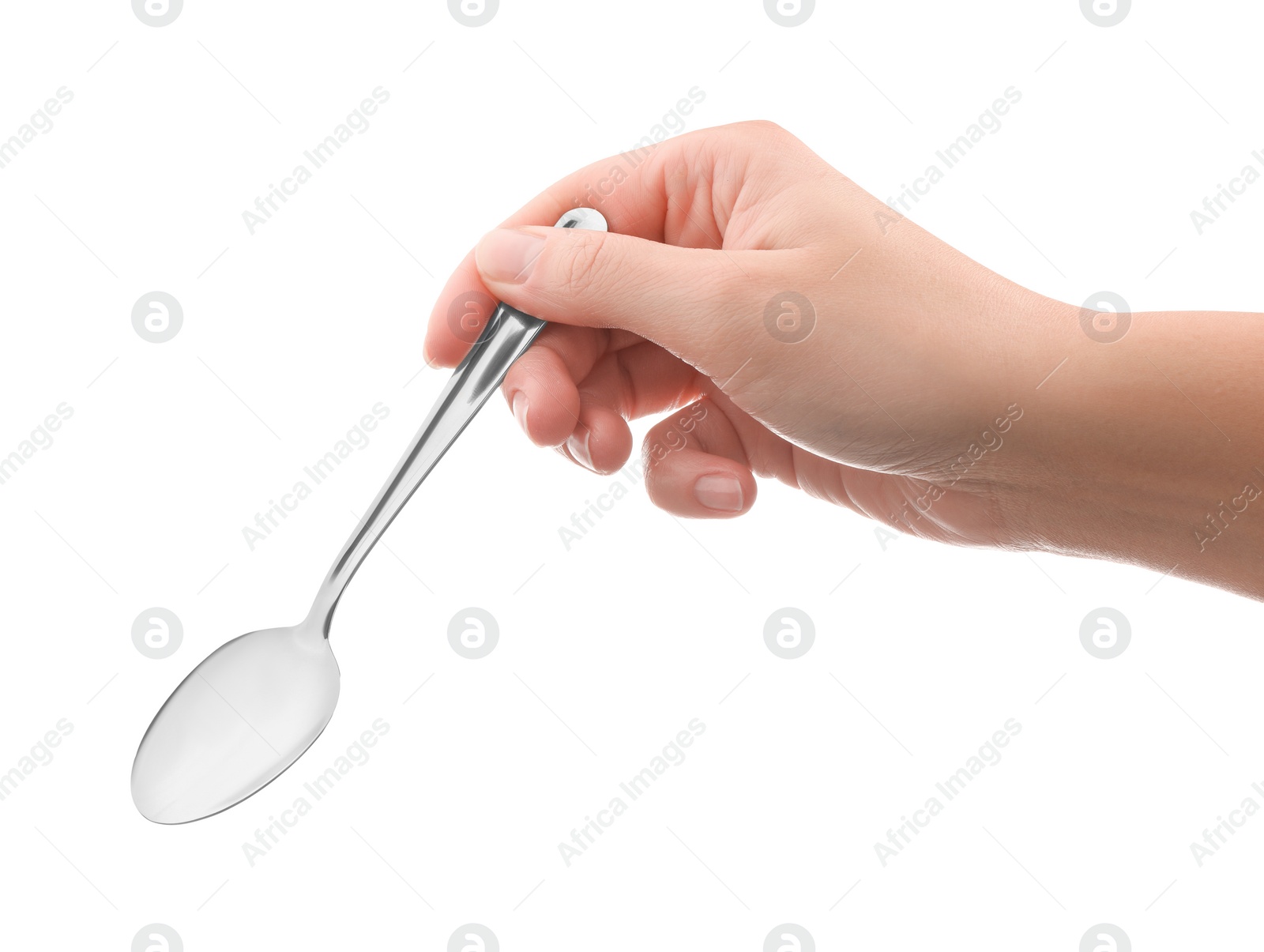 Photo of Woman holding new shiny spoon on white background, closeup