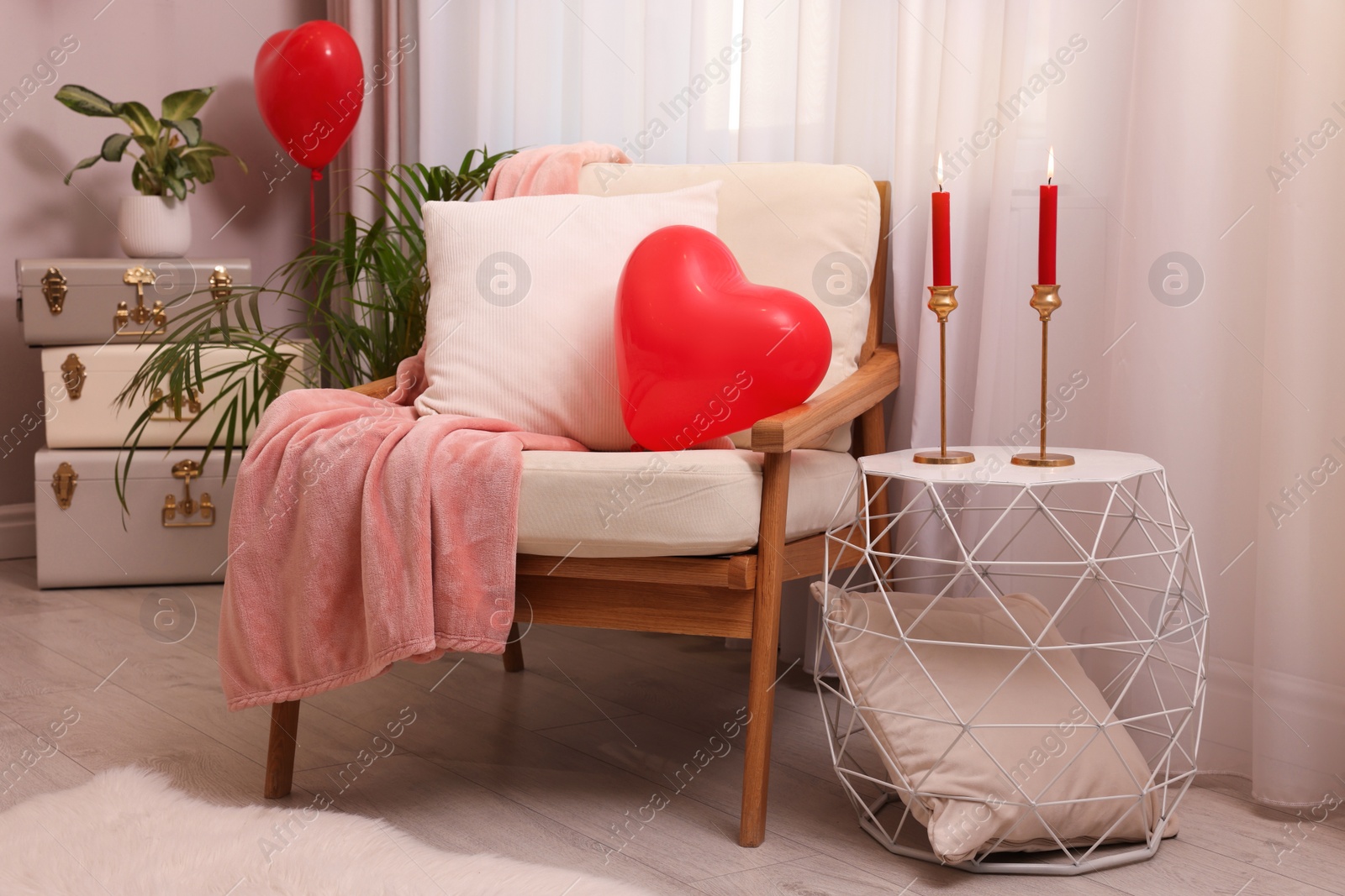 Photo of Cozy room decorated for Valentine Day. Interior design