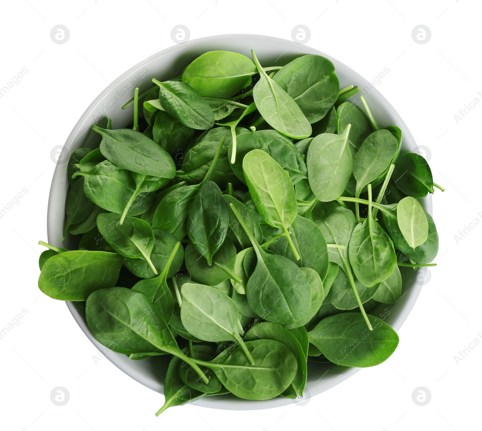 Photo of Bowl of fresh green healthy baby spinach on white background, top view