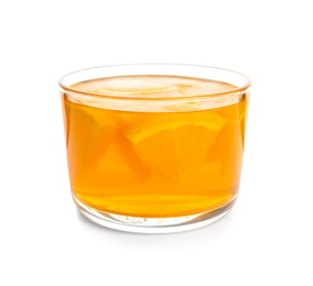 Tasty jelly dessert with slices of orange in glass on white background