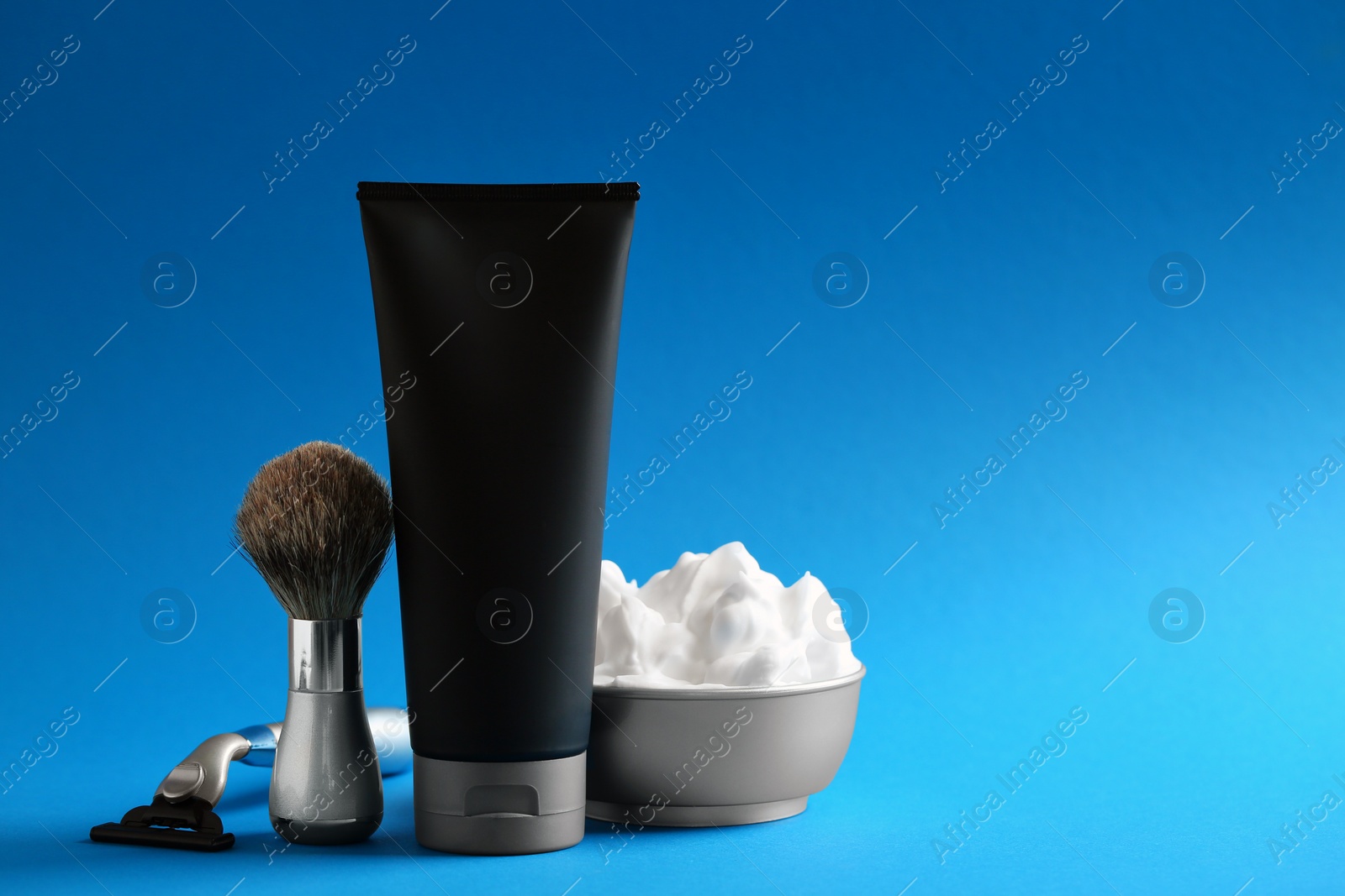 Photo of Set of shaving equipment and men's cosmetic products on color background. Space for design