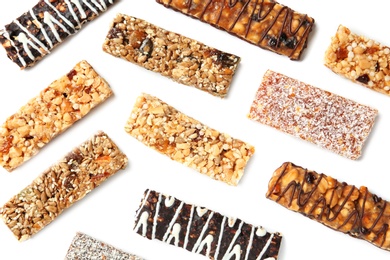 Different grain cereal bars on white background. Healthy snack