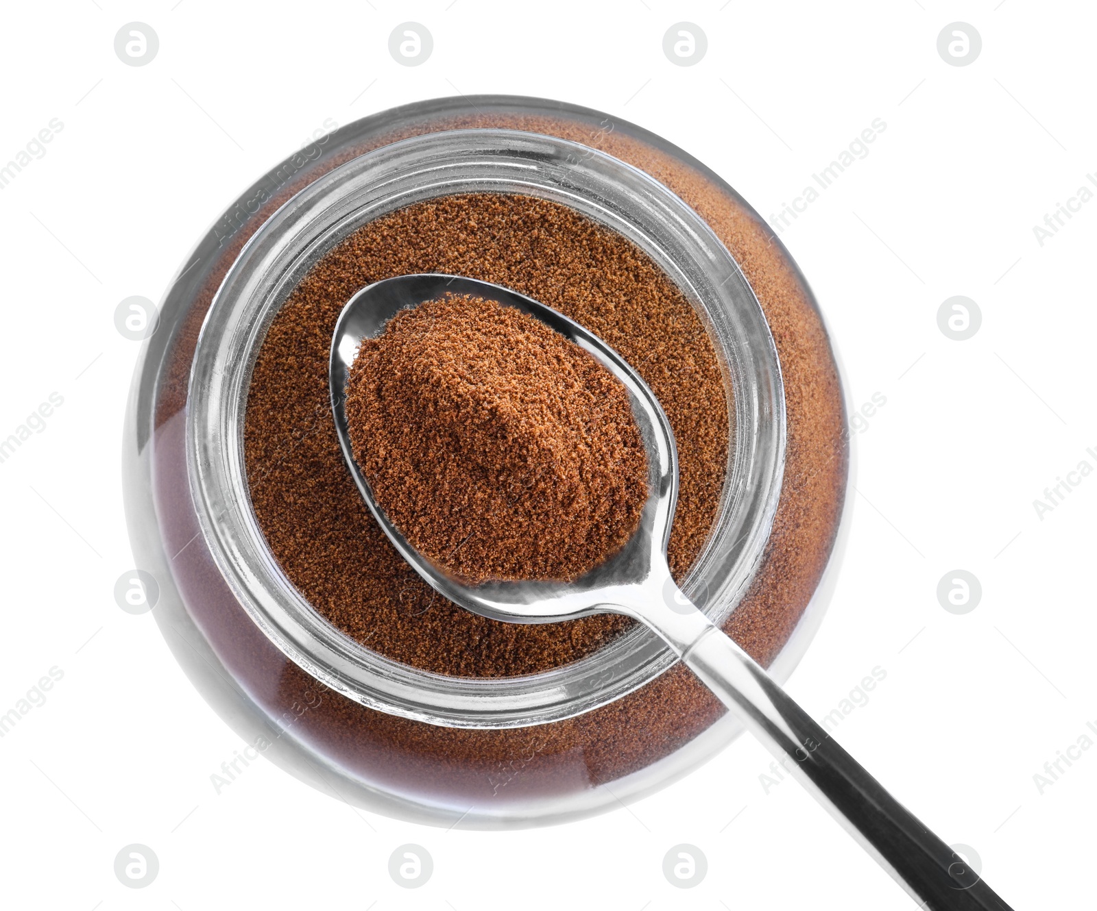 Photo of Spoon with instant coffee above glass jar isolated on white, top view