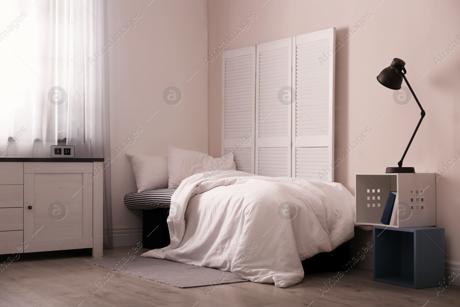 Photo of Modern teen room interior with comfortable bed