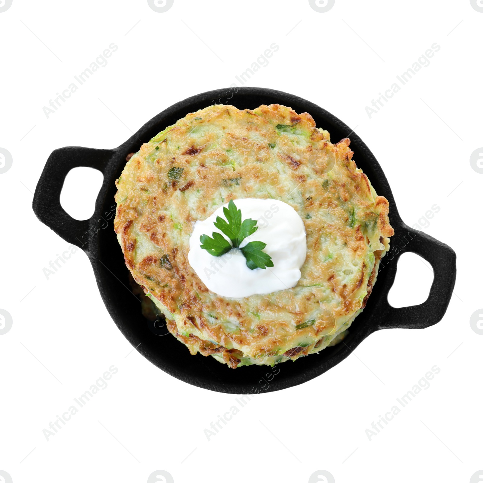 Photo of Delicious zucchini fritters with sour cream on white background, top view