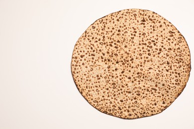 Photo of Tasty matzo isolated on white, top view. Passover (Pesach) celebration