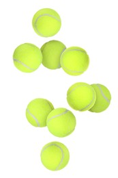 Image of Many tennis balls flying on white background