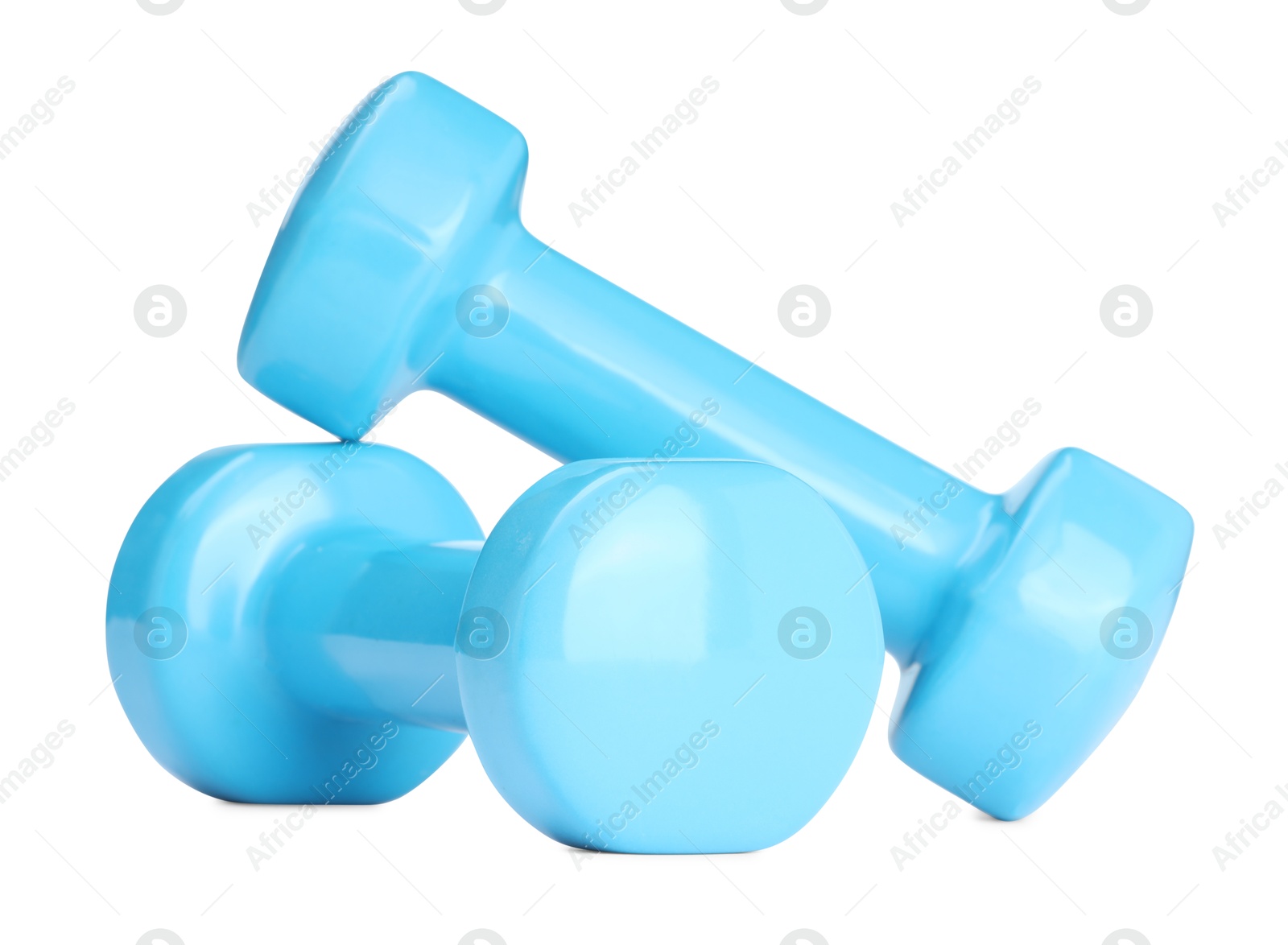 Photo of Light blue dumbbells isolated on white. Sports equipment