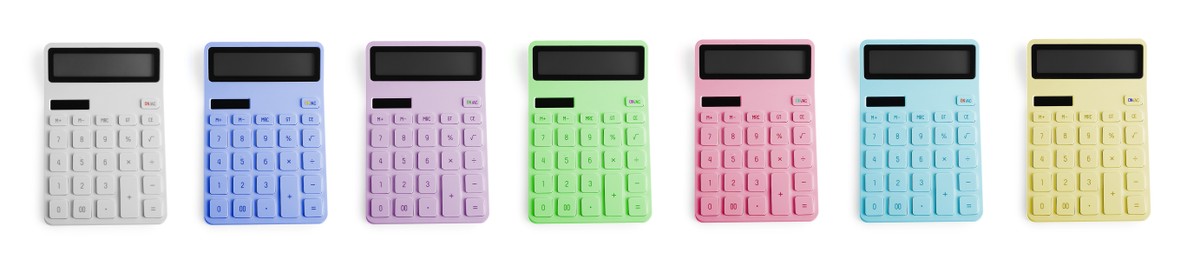 Set with multicolored calculators on white background, top view. Banner design