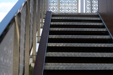 Photo of View of metal outdoor stairs with railing